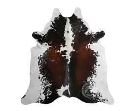 Black and White Reddish Cowhide Rug