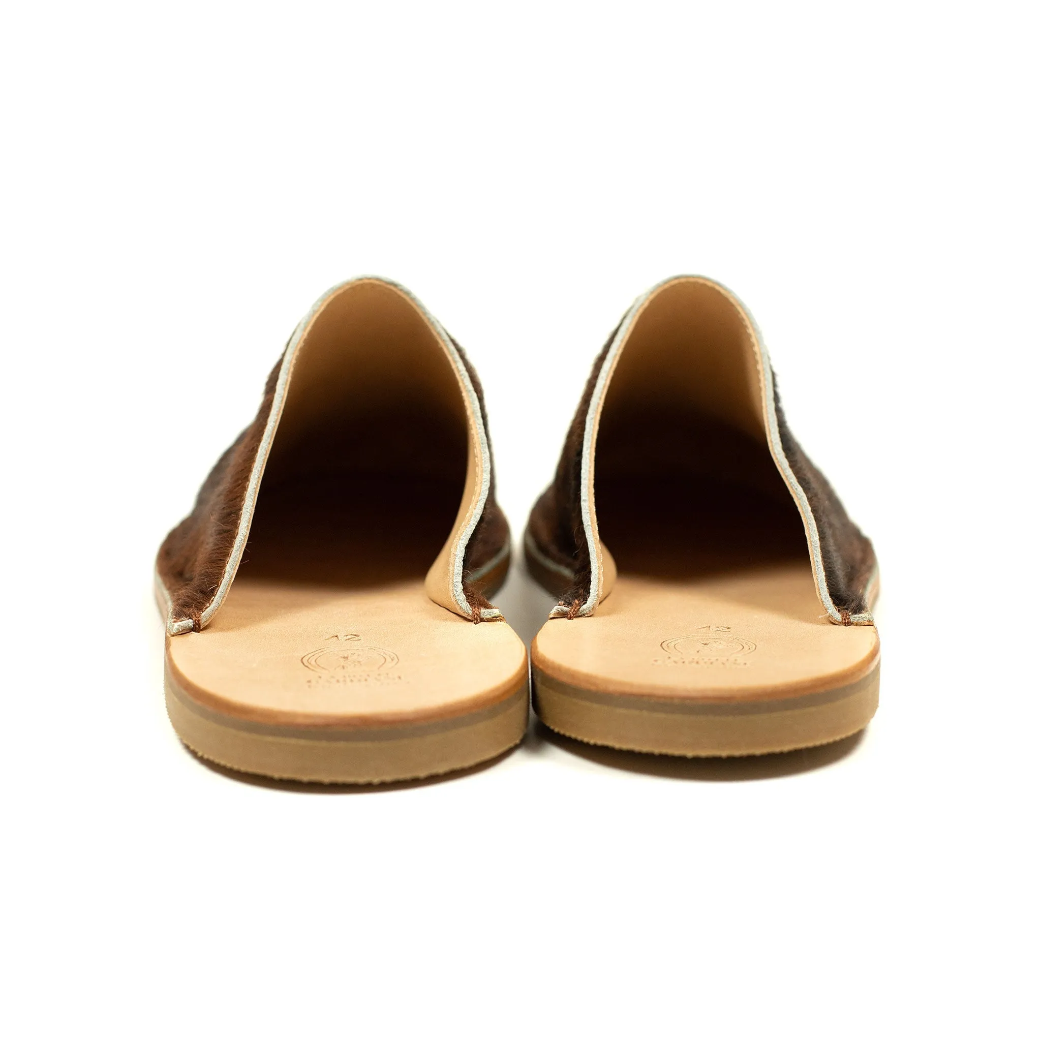 Exclusive mules in hair-on Normande calf