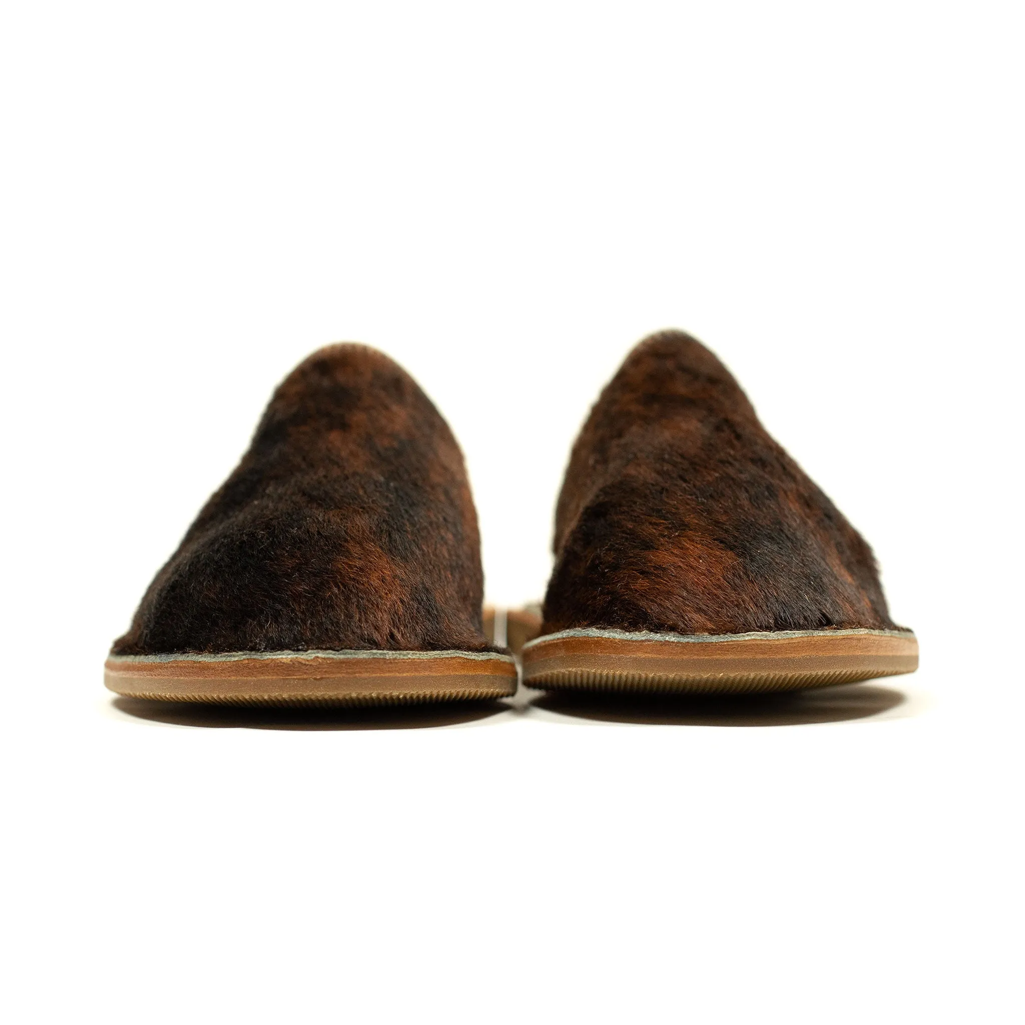 Exclusive mules in hair-on Normande calf